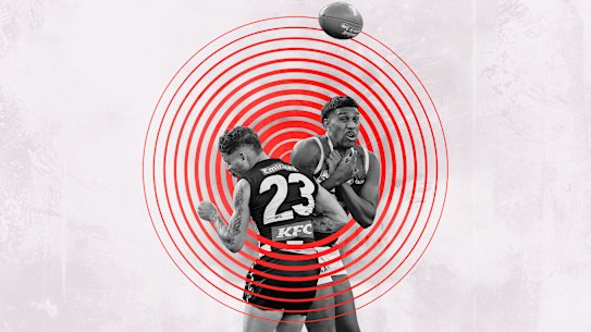 Collingwood’s Bobby Hill bumps the Brisbane Lions’ Keidean Coleman during the 2023 grand final.