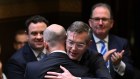 Premier Dominic Perrottet hugs Treasurer Matt Kean after the NSW budget was handed down on Tuesday.