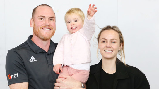 Retiring footballer Jarryd Roughead with wife Sarah and daughter Pippa.