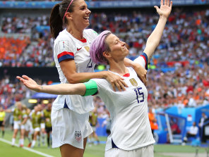 Megan Rapinoe (right) leads the charge for equal pay in USA.