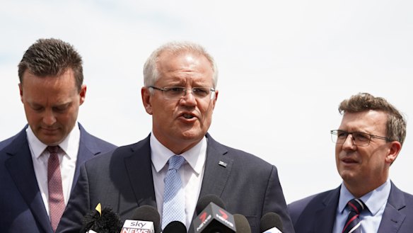 Prime Minister Scott Morrison speaks during a visit to Skye in February with Minister for Cities, Urban Infrastructure and Population Alan Tudge and Member for Dunkley Chris Crewther.