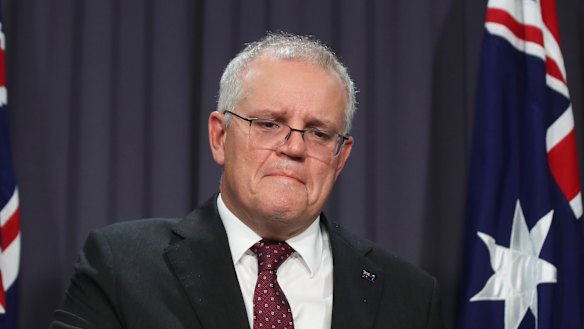 A visibly distressed Prime Minister Scott Morrison at a press conference in Canberra on Tuesday.