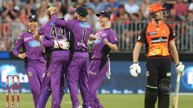 James Faulkner is congratulated by teammates after dismissing Cameron Bancroft.