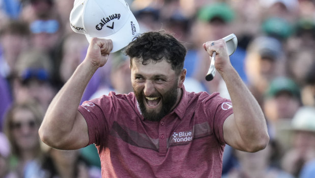 Jon Rahm celebrates on the final hole of The Masters.