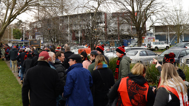 Fans queue for the elimination final between the Bulldogs and Essendon at University of Tasmania Stadium.