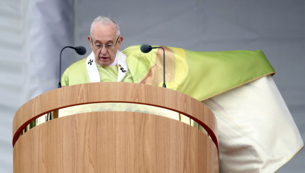Pope Francis issues an apology to victims of abuse in Ireland at the start of Mass on Sunday.