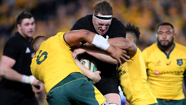 Unstoppable: Brodie Retallick makes a bust for the All Blacks in the Bledisloe Cup opener at ANZ Stadium
