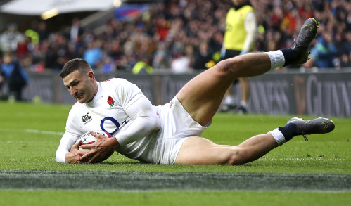 Jonny May scores for England.