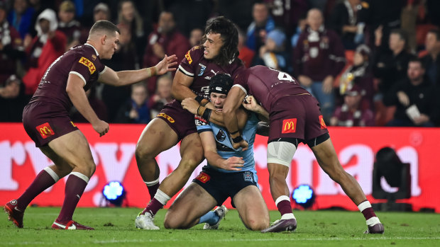 Tino Fa’asuamaleaui got stuck into Matt Burton last year’s Origin decider.