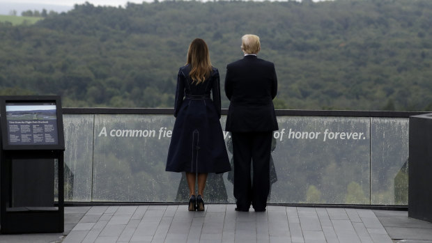 President Donald Trump and first lady Melania Trump, stand at a memorial site in Pennsylvania.