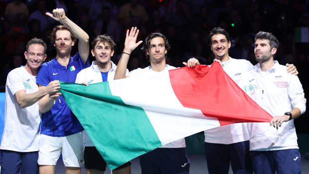 Italy’s Davis Cup team, including Sinner (second from left), celebrates in Malaga.