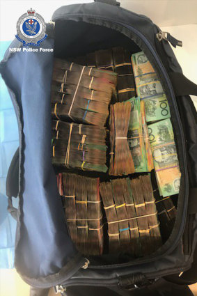 Cash, prohibited drugs and firearms were seized. 