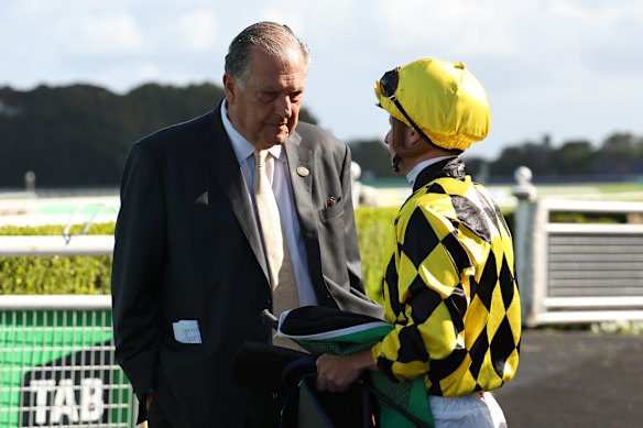 John Messara speaks with jockey James McDonald after Autumn Glow’s win in the Verry Elleegant Stakes at Randwick.