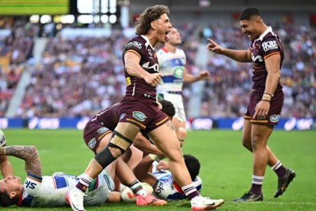 Origin-bound? Reece Walsh (centre) celebrates his try-assist as Brisbane beat the Warriors.