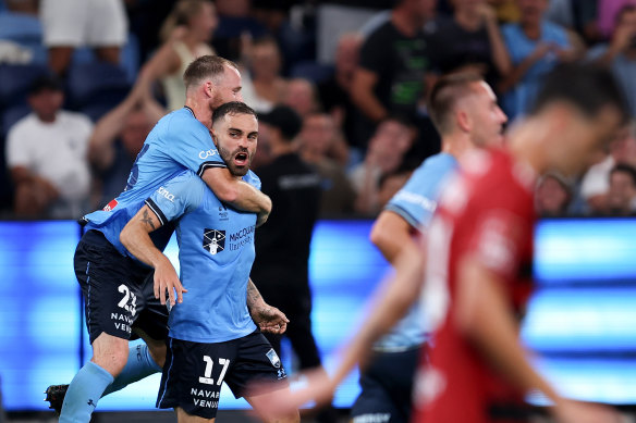 Anthony Caceres celebrates his stoppage-time goal.