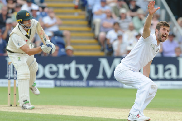 Mark Wood (right) celebrates after trapping Shane Watson lbw in Watson’s final Test innings at Cardiff in 2015.
