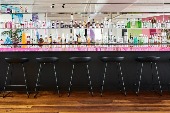The nine-metre-long bar that features the reception counter at one end.