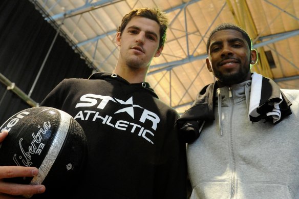 NBA All-Star Kyrie Irving (right) with Collingwood’s Scott Pendlebury on July 1, 2013.