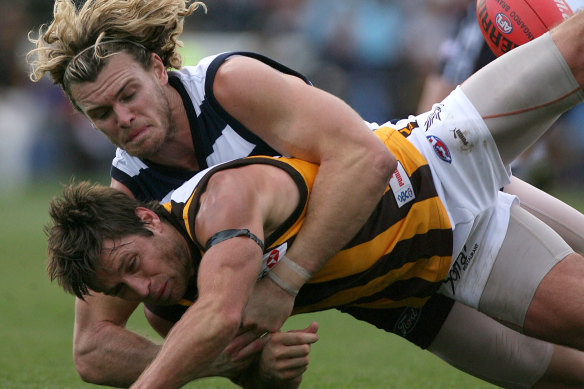 Cameron Mooney wrapped up Shane Crawford in a thumping tackle the last time the Hwks visited Kardinia Park, in 2006.