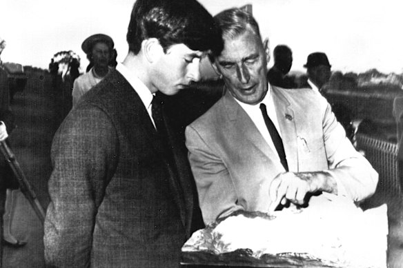 Prince Charles and Sir William Hudson with a scale model of the Jindabyne Dam in April 1966. 