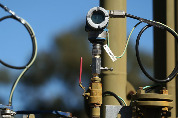 Pressure transmitters display readings on a Santos pilot well operating in the Pilliga forest in Narrabri.