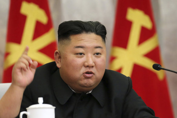 In this undated photo provided by the North Korean government, Kim Jong-un speaks during a meeting of the Seventh Central Military Commission of the Workers' Party of Korea.