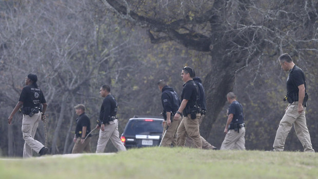 Police search a field near the Pecan Grove Maufactured Home Community in Schertz, Texas where six-year-old Kameron Prescott was shot.</p>
<p>