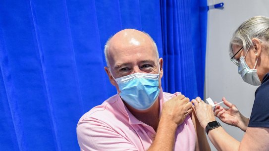 Tim Adamson, 51, was among those getting the AstraZeneca vaccine at the  Melbourne Convention and Exhibition Centre on Monday.