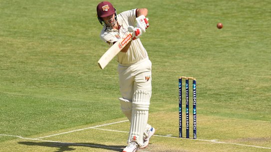 Joe Burns of Queensland bats during the Marsh Sheffield Shield match against the Tasmanian Tigers at the Gabba on Friday.