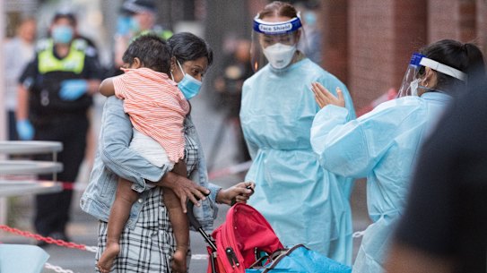 Returning travellers arrive at the Intercontinental Hotel to begin their quarantine period.