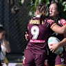 Kerri Johnson celebrates scoring one of her two tries on her NRLW debut.