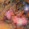 This image, comprised of 678 separate images taken by NSF–DOE Vera C. Rubin Observatory in just over seven hours of observing time, shows the Trifid nebula (top) and Lagoon nebula, both of which are thousands of light years away from Earth.