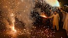 People light fireworks to celebrate Pakistan and India reaching a ceasefire deal.
