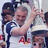LONDON, ENGLAND - MAY 23: Ange Postecoglou, Manager of Tottenham Hotspur, lifts the UEFA Europa League trophy during the Tottenham Hotspur UEFA Europa League trophy parade on May 23, 2025 in London, England. Spurs defeated Manchester United in the final in Bilbao on May 21 to win their first major trophy in 17 years. (Photo by Harry Murphy/Getty Images)