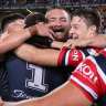 The Roosters celebrate back-to-back grand final wins after a controversial defeat of the Raiders.