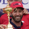 Team USA players and captains with the trophy.