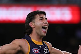 Josh Rachele of the Crows celebrates a goal.