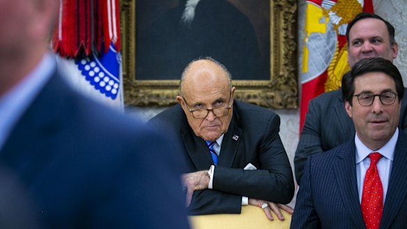 Rudy Giuliani, centre, former mayor of New York, now a lawyer to Donald Trump.