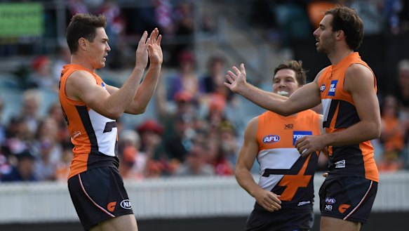 Jeremy Cameron (left) boots another goal for the Giants.