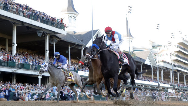 Medina Spirit crosses the line to give trainer Bob Baffert his seventh Kentucky Derby winner.