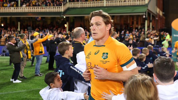 Michael Hooper leads the Wallabies on to the SCG in the deciding Test against England.