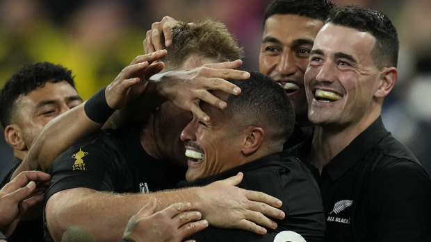 The All Blacks celebrate Aaron Smith’s try in their dominant win over Argentina.