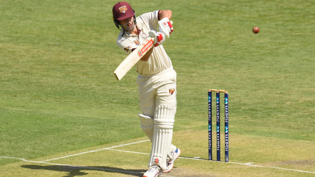 Joe Burns of Queensland bats during the Marsh Sheffield Shield match against the Tasmanian Tigers at the Gabba on Friday.