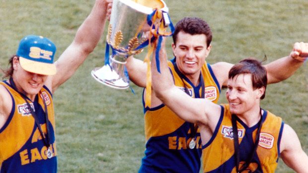 Former Eagles Glen Jakovich, Peter Sumich, John Worsfold  with football's most sought-after prize.
