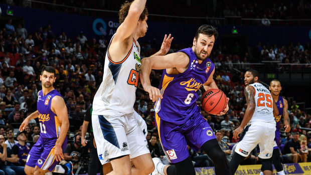 Finding form: Andrew Bogut drives to the basket for Sydney in their win over Cairns.