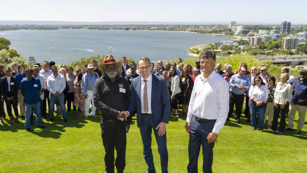 Foreground left-to-right, Muuki Taylor (Martu Elder), BHP chief executive Andrew Mackenzie and Richard Walley (Noongar Elder).