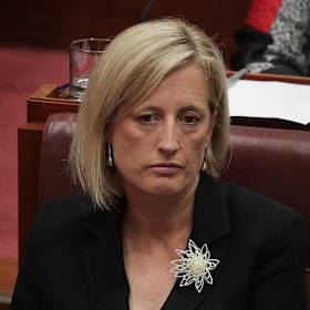 Katy Gallagher resumes her seat after speaking in the Senate in December.