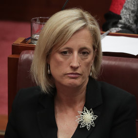 Katy Gallagher resumes her seat after speaking in the Senate in December.