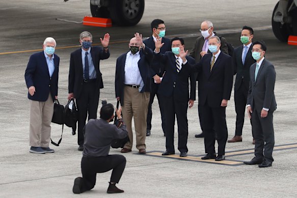 From left, former US senator Chris Dodd, former deputies secretary of state James Steinberg and Richard Armitage have their photo taken with Taiwanese Foreign Minister Joseph Wu upon arrival in Taipei, Taiwan.