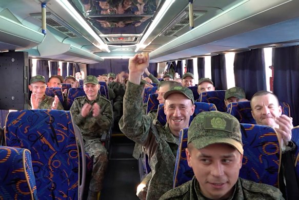 Russian servicemen make their way home after being released from captivity in Ukraine.
